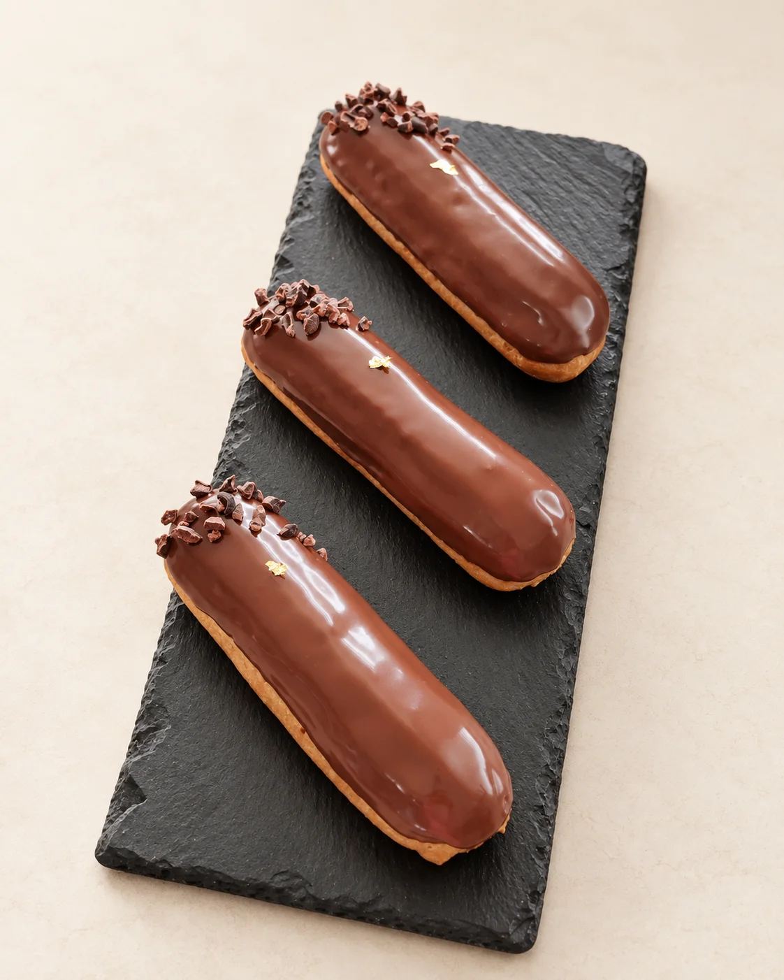 Drei Schokoladenéclairs